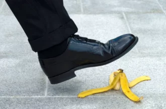 a person is going to step on a banana peel